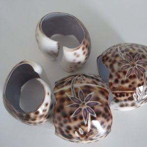 Set of 4 hand-carved shell napkin rings